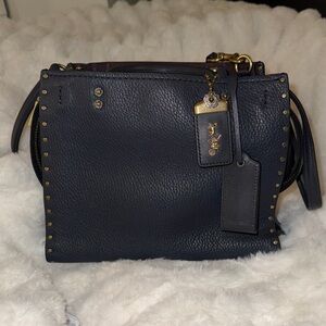 EXCELLENT CONDITION COACH ROGUE 25 with Rivets Navy BLUE